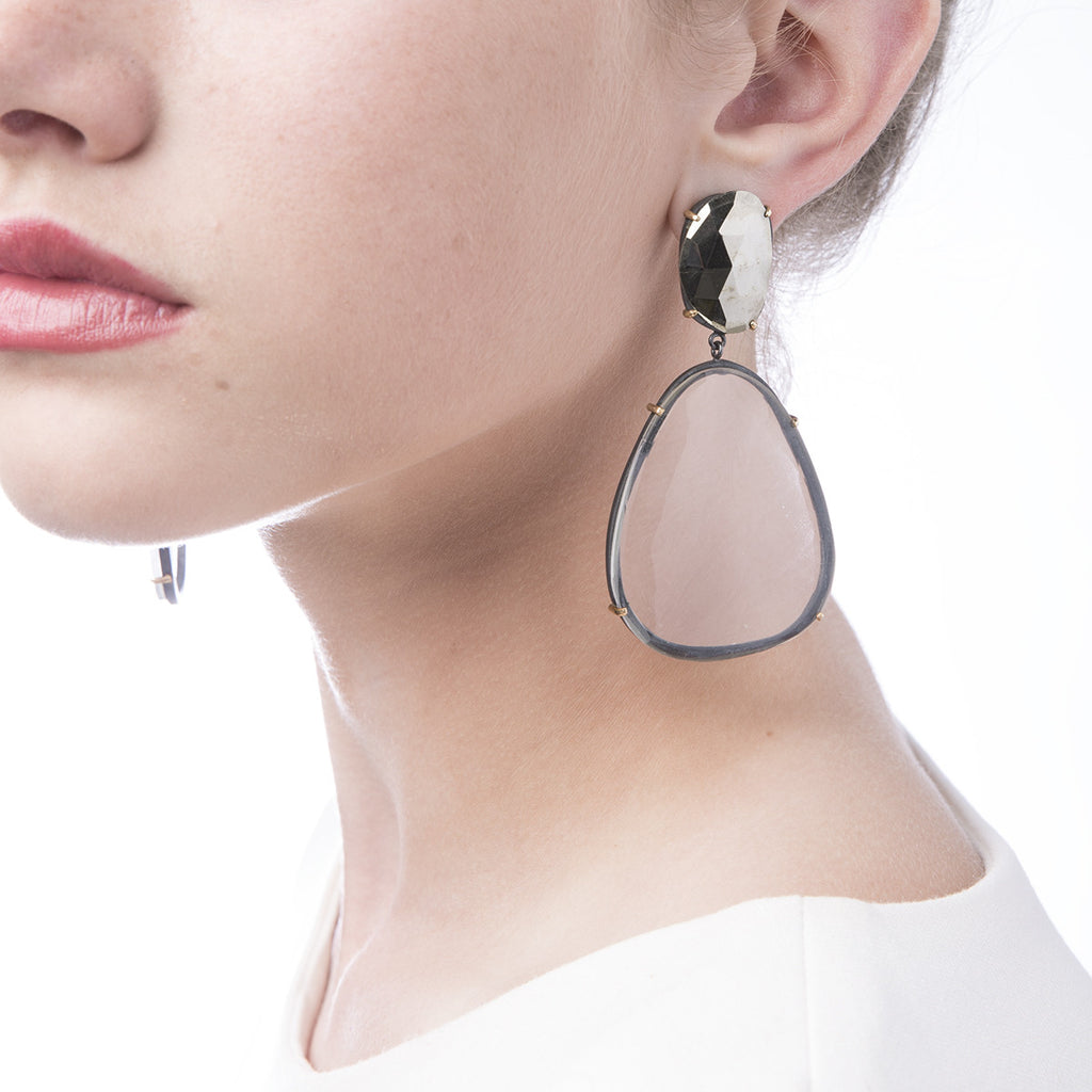 Image of Slant Fine Jewelry's Faceted Quartz Crystal and Pyrite Earrings worn by a woman
